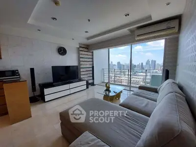 Spacious living room with panoramic city view and modern furnishings