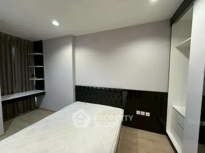 Modern bedroom with minimalist design and built-in storage solutions