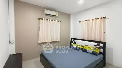 Cozy bedroom with modern decor and air conditioning