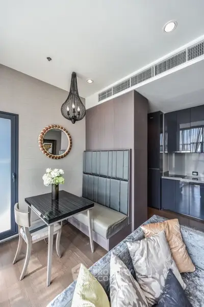 Modern living room with elegant dining area and stylish decor