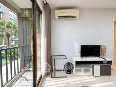 Modern living room with balcony view in stylish apartment