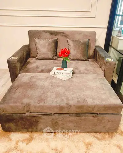 Luxurious convertible sofa bed with plush cushions and elegant decor in a cozy living room setting.