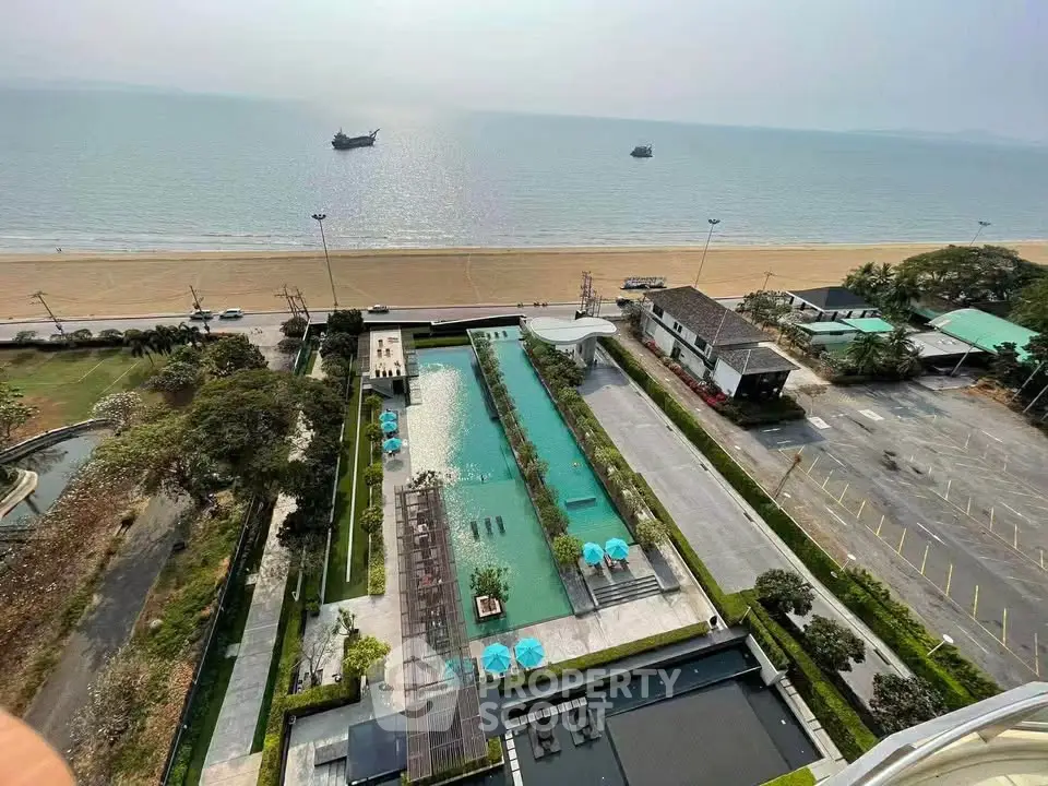 Stunning beachfront property with pool and ocean view, perfect for luxury living.