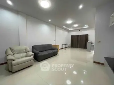Spacious modern living room with sleek furniture and minimalist design