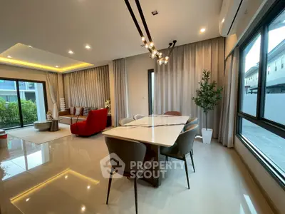 Spacious modern living and dining area with elegant decor and natural light