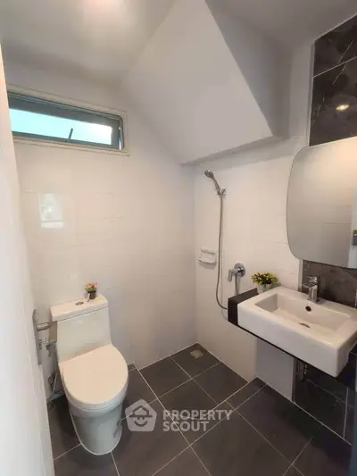 Modern bathroom with sleek fixtures and elegant tile design