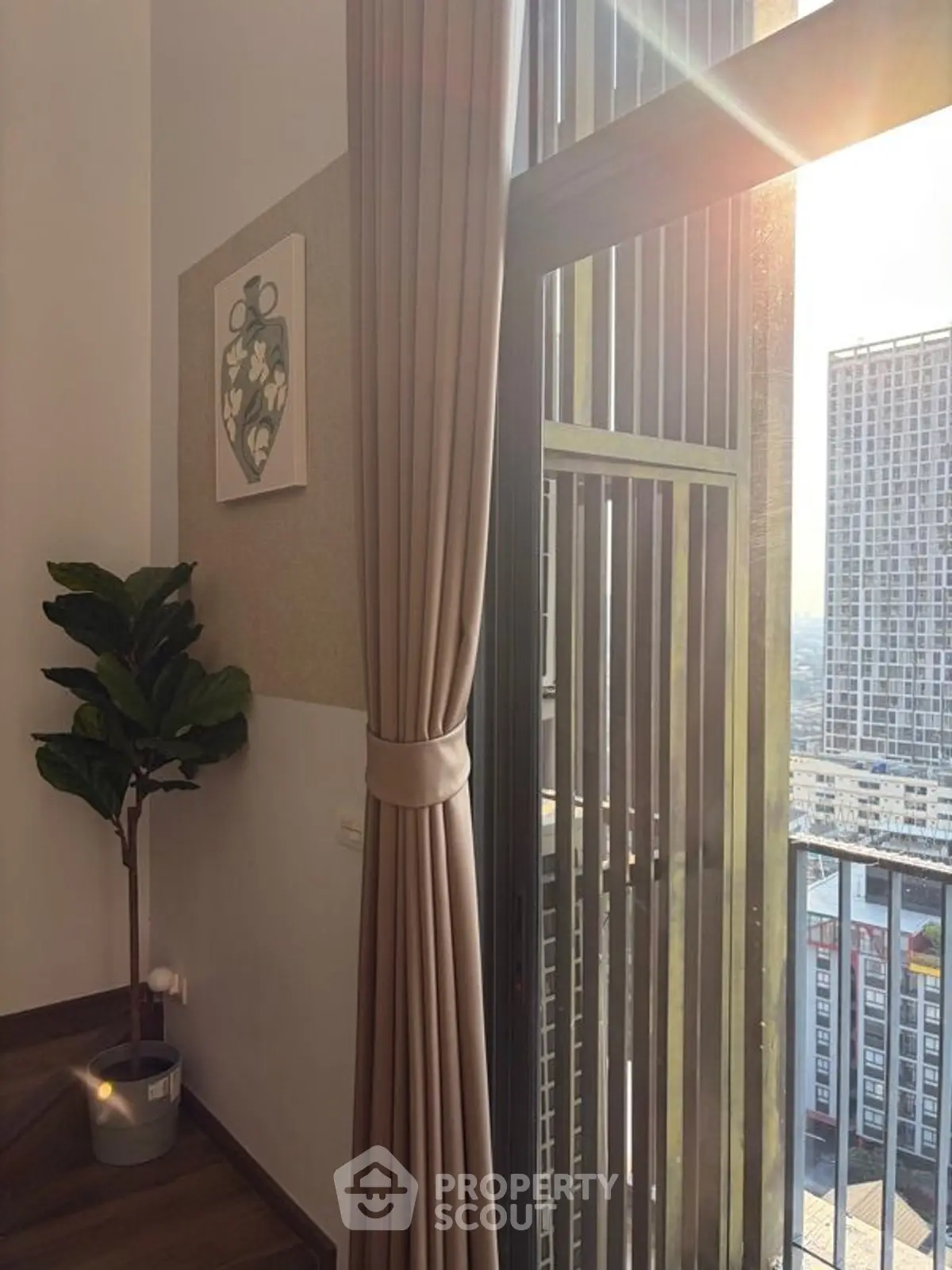 Stylish balcony view with modern decor and cityscape backdrop