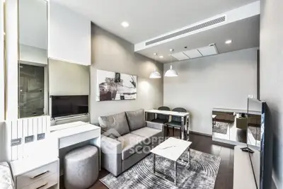Modern living room with stylish decor and comfortable seating in a contemporary apartment.