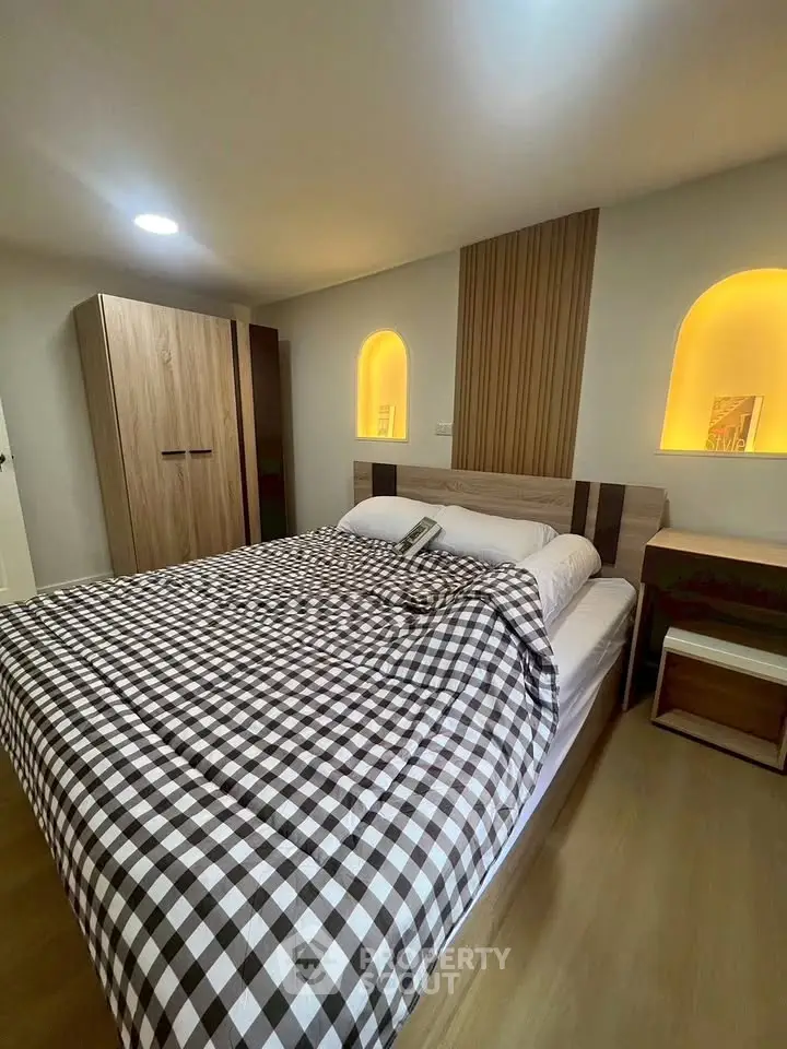 Cozy bedroom with modern design and warm lighting