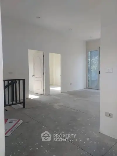 Spacious unfinished interior with natural light and open layout, ideal for customization.