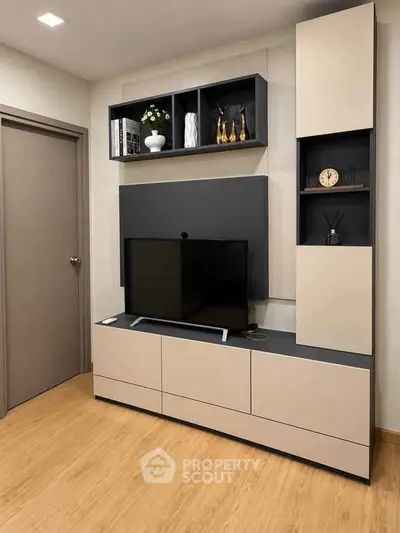 Modern living room with sleek TV unit and stylish decor