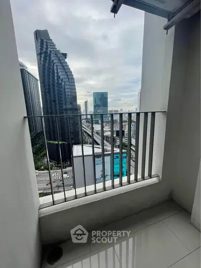 Modern balcony with stunning cityscape view, perfect for urban living enthusiasts.