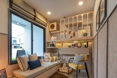 Charming small living room with cozy seating and playful decor