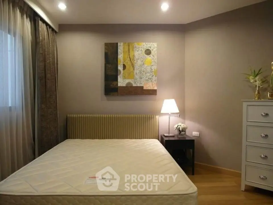 Cozy bedroom with modern decor and soft lighting