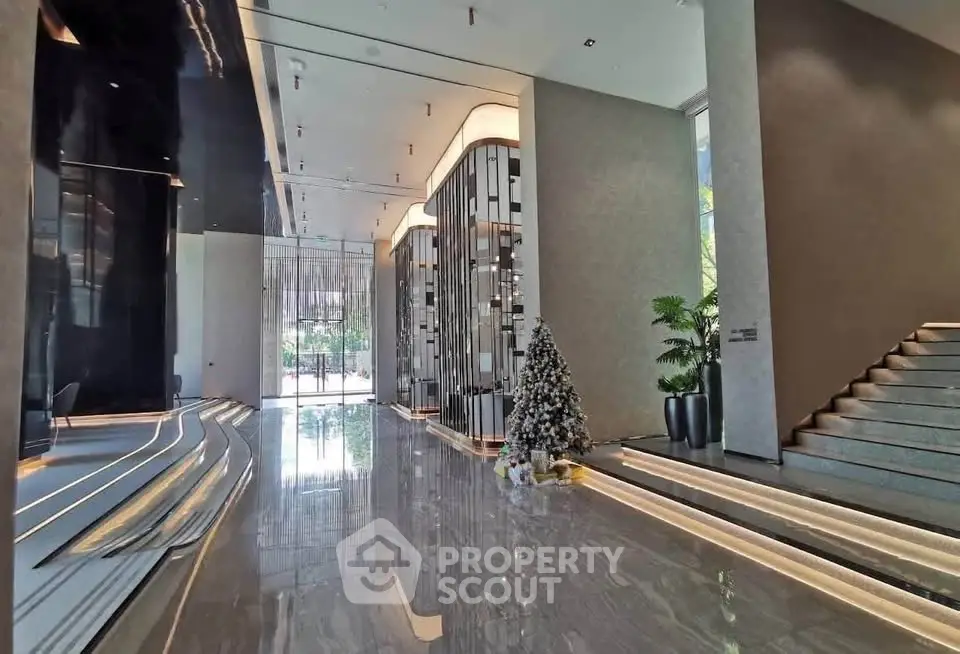 Luxurious modern building entrance with sleek design and elegant lighting