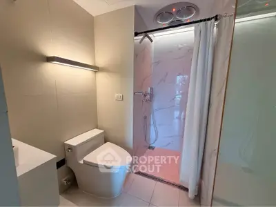 Modern bathroom with sleek design and spacious shower area