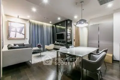Modern living room with elegant dining area and stylish decor