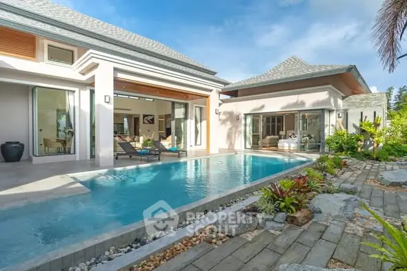 Luxurious villa with private pool and lush garden, perfect for serene living.
