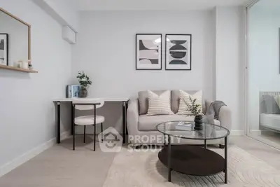 Modern living room with stylish decor and cozy seating area, perfect for relaxation and entertaining.