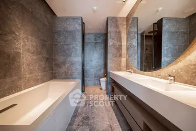 Luxurious modern bathroom with elegant fixtures and spacious design