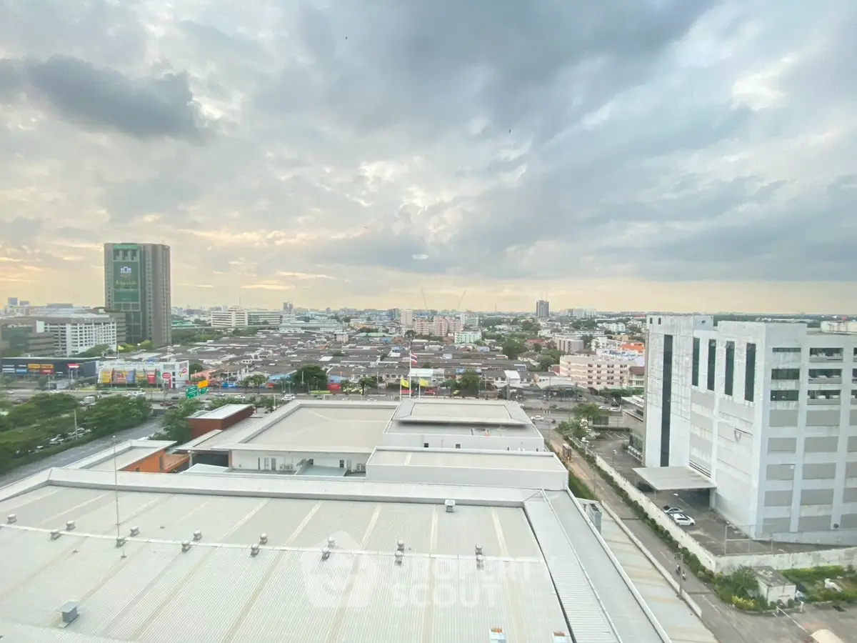 Stunning cityscape view from high-rise building with expansive skyline and urban landscape.