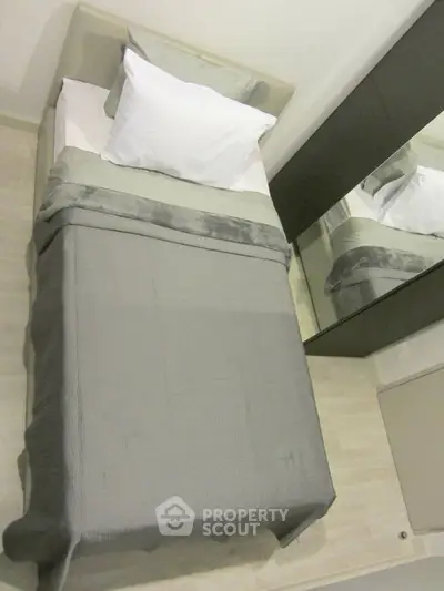 Cozy bedroom with modern design and mirrored wardrobe