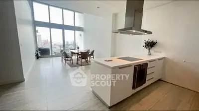 Spacious modern kitchen with open layout and stunning city view