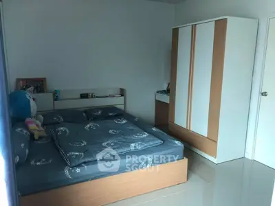 Cozy bedroom with modern furniture and natural light
