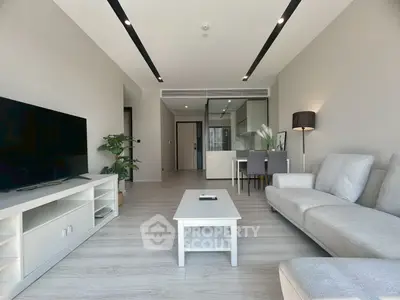 Modern living room with sleek furniture and open layout, perfect for contemporary living.