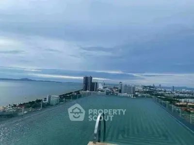Stunning rooftop infinity pool with breathtaking city and ocean views.
