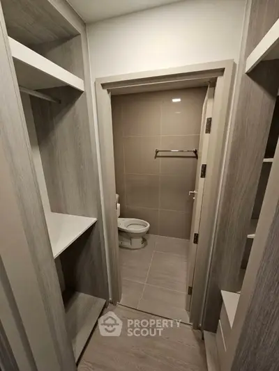 Modern bathroom with sleek design and integrated storage solutions