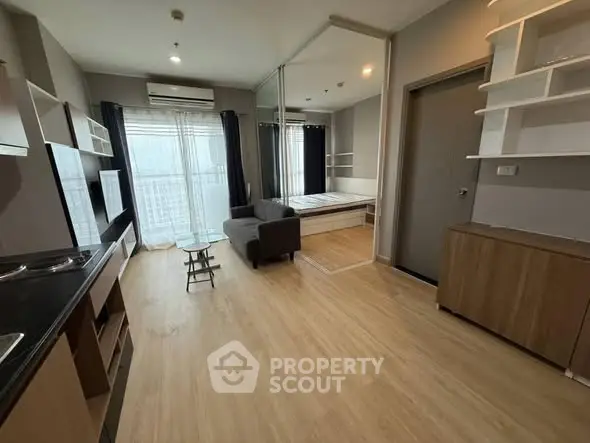 Modern studio apartment with open layout and stylish furnishings