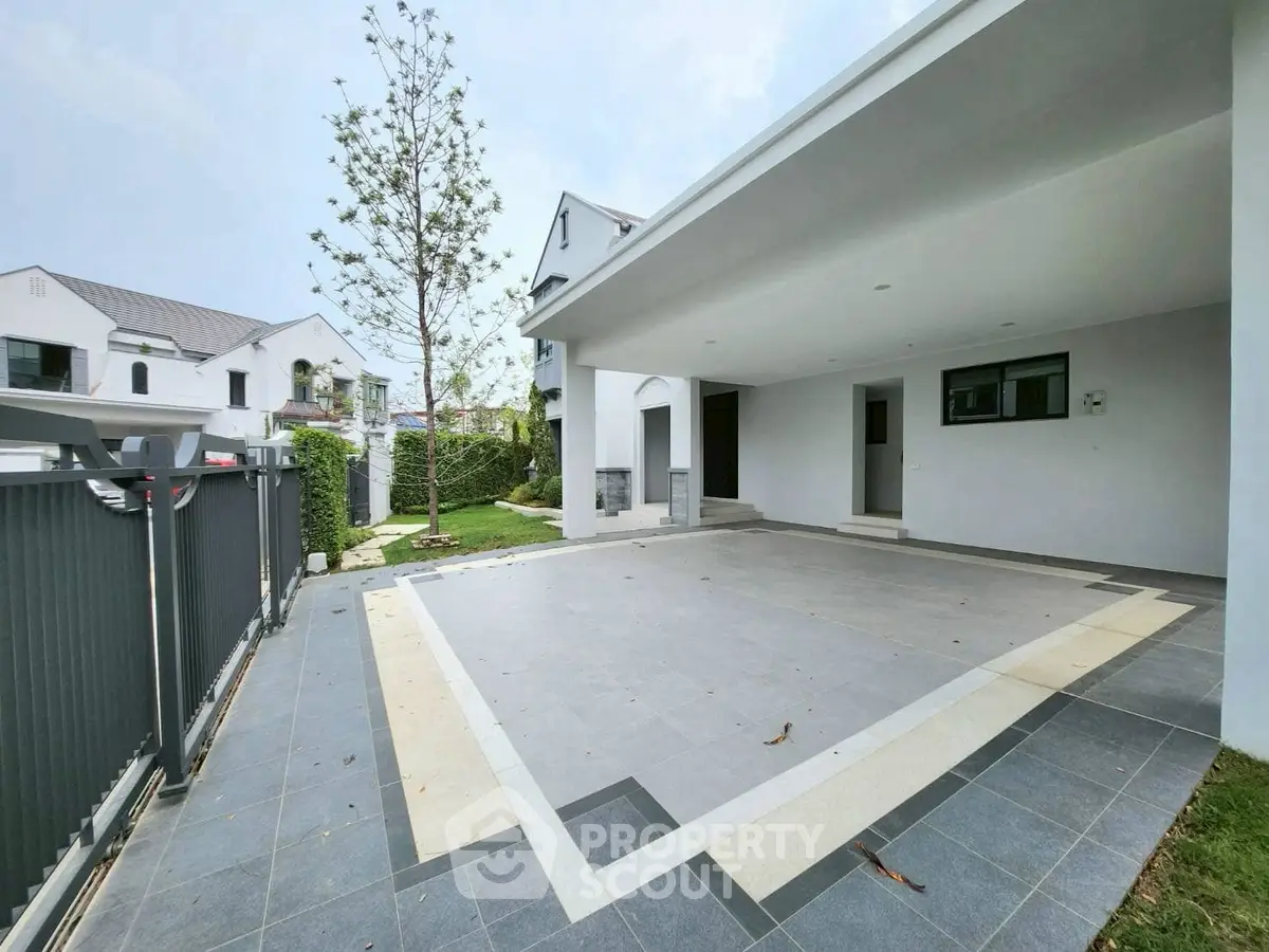 Spacious modern driveway with sleek design and ample parking space