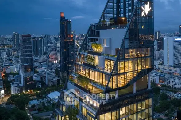 Stunning modern skyscraper with unique architecture and cityscape view at dusk.