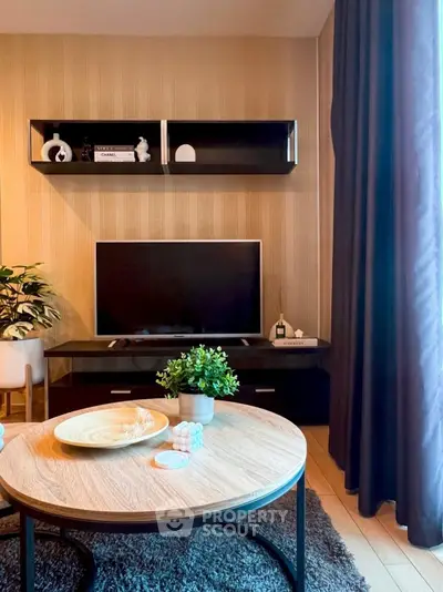 Stylish living room with modern decor and entertainment center