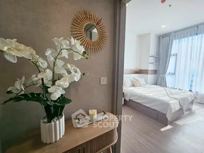 Elegant bedroom with natural light and stylish decor