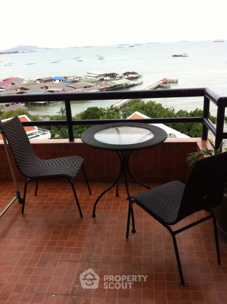 Spacious balcony with breathtaking sea views, perfect for alfresco dining and relaxation, featuring modern outdoor furniture.