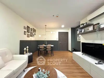 Modern living room with stylish decor and open dining area