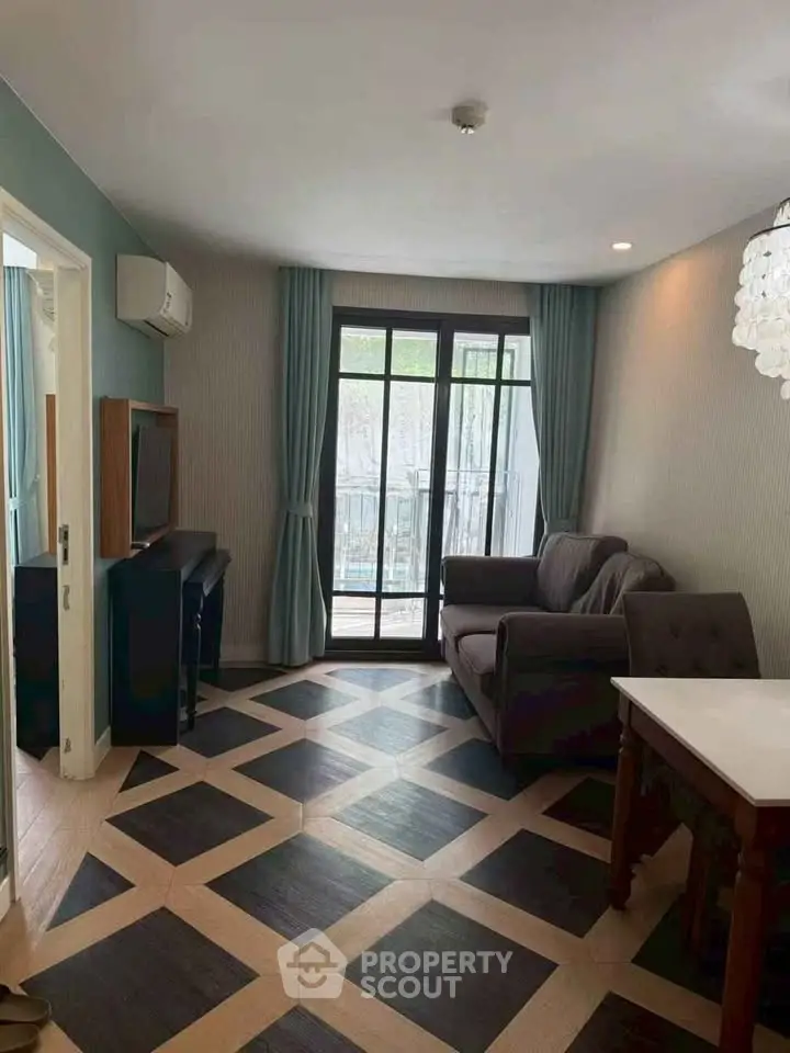 Stylish living room with modern decor and balcony access