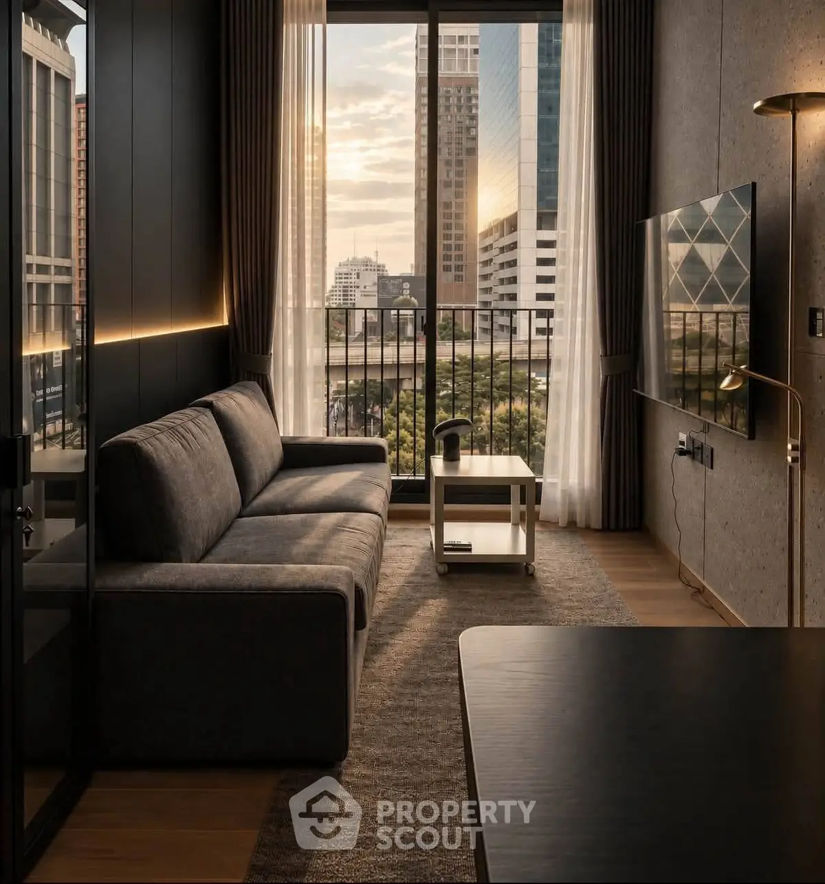 Modern living room with city view, stylish sofa, and large TV, perfect for urban living.