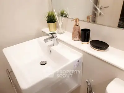 Modern bathroom with sleek sink and stylish decor