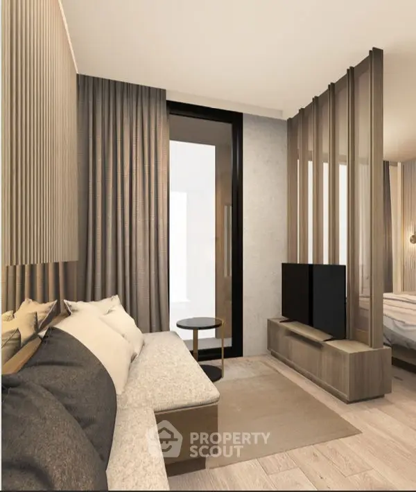 Modern living room with stylish decor and open layout, featuring a cozy sofa and sleek TV stand.