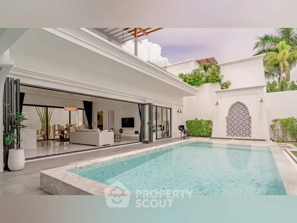 Luxurious villa with open living room and private pool, perfect for relaxation and entertainment.