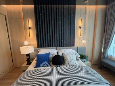 Luxurious modern bedroom with stylish decor and ambient lighting