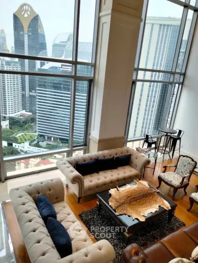 Luxurious high-rise living room with stunning city view and elegant furnishings.