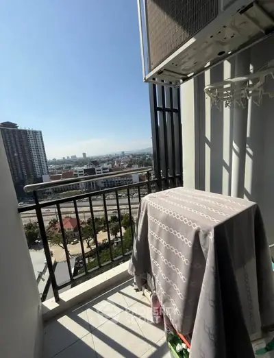 Charming balcony with city view, perfect for relaxation and enjoying the skyline.