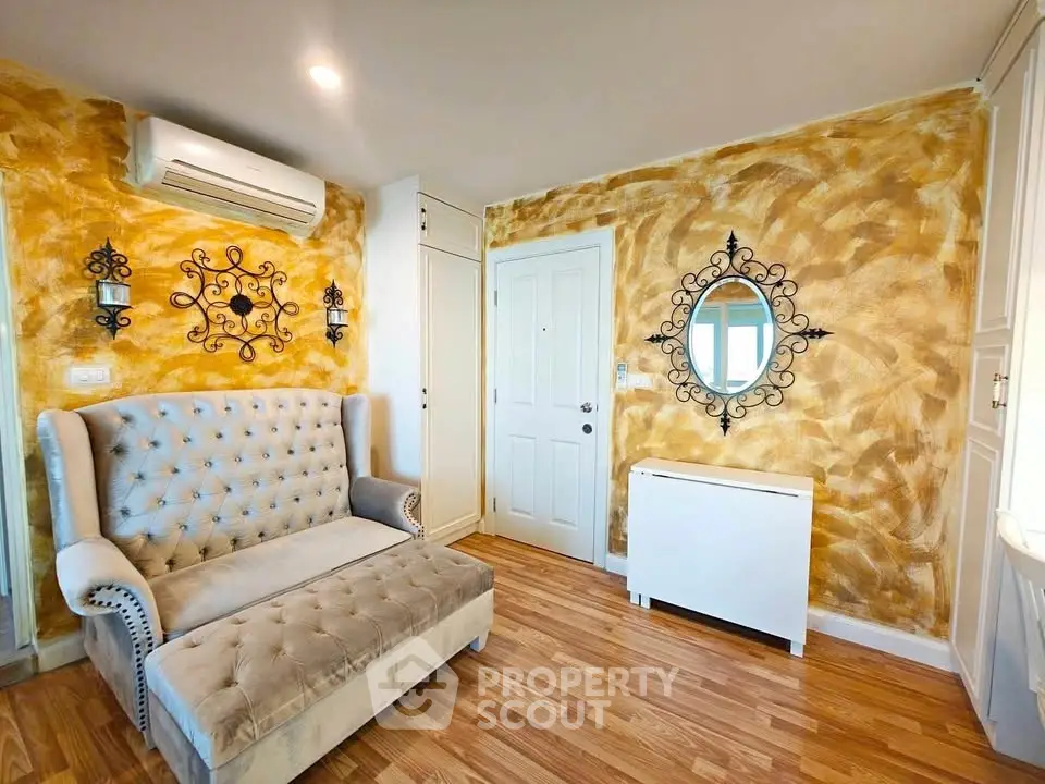 Charming living room with elegant sofa and artistic wall decor