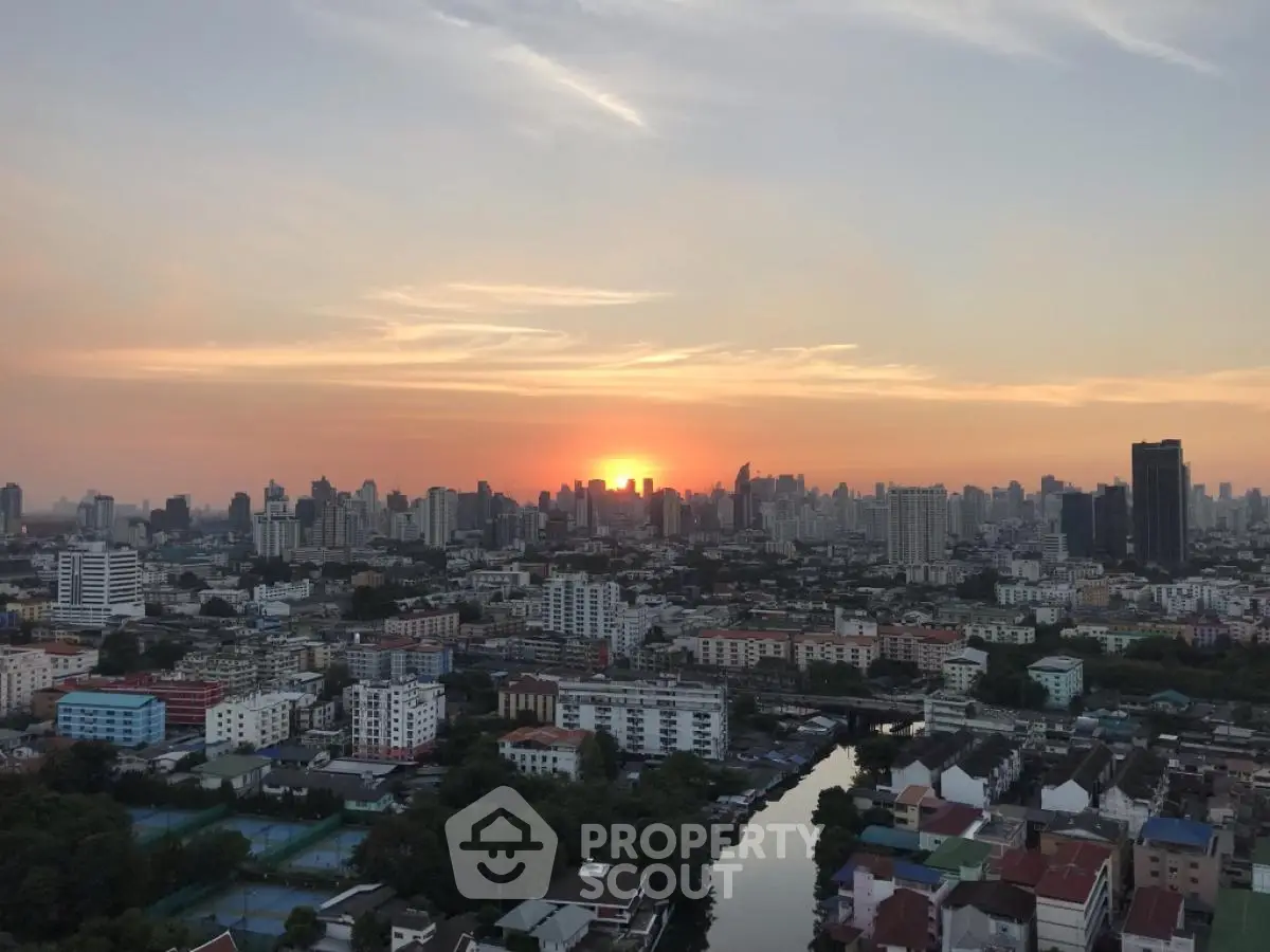 Stunning cityscape view at sunset showcasing urban skyline and vibrant neighborhood.