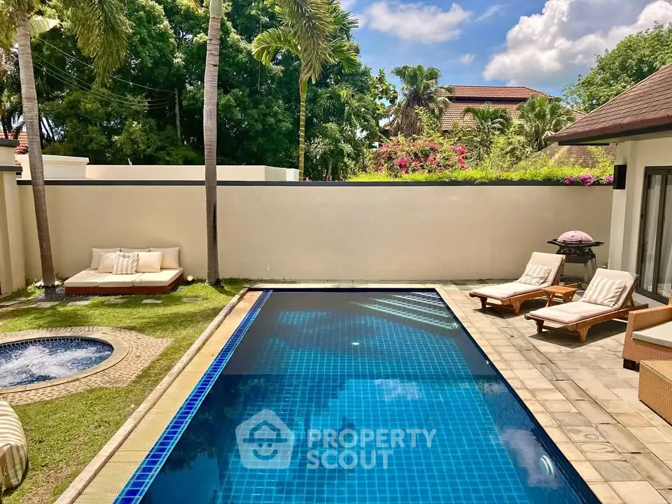 Luxurious villa with private pool and lush garden, perfect for relaxation and entertainment.