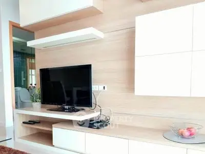 Modern living room with sleek TV unit and stylish decor